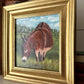 Grazing Donkey in a Field of Green
